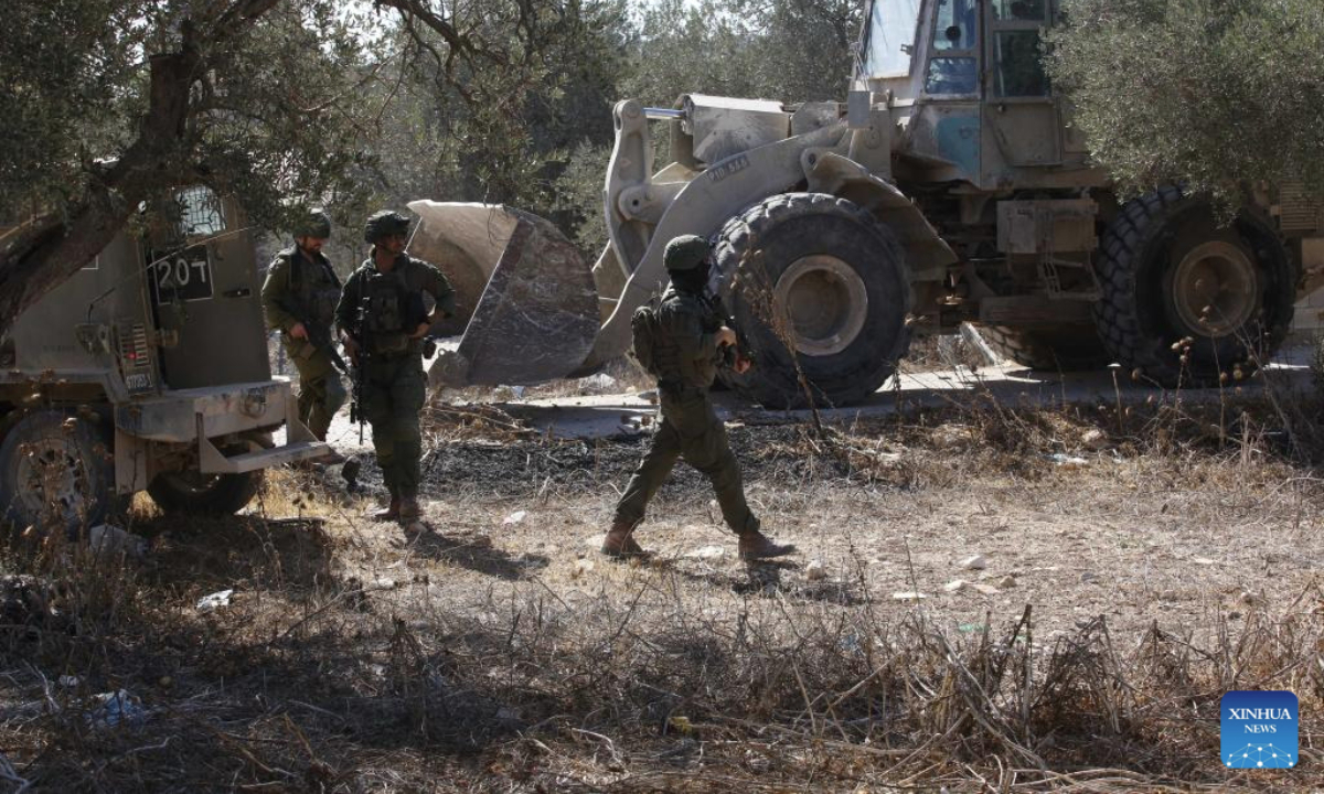 Members of Israeli forces carry out an operation in Qabatiya town, south of the West Bank city of Jenin, on July 17, 2025. (Photo by Nidal Eshtayeh/Xinhua)