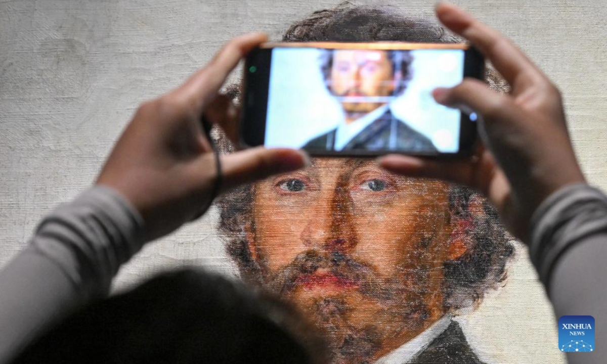 A visitor takes a photo of the portrait of Ilya Repin at the exhibition Ilya Repin Encyclopedia of Russian Life in the National Museum of China in Beijing, capital of China, July 22, 2025.

The exhibition kicked off here Tuesday, showcasing 92 representative pieces by Russian realist painter Ilya Repin. (Xinhua/Jin Liangkuai)