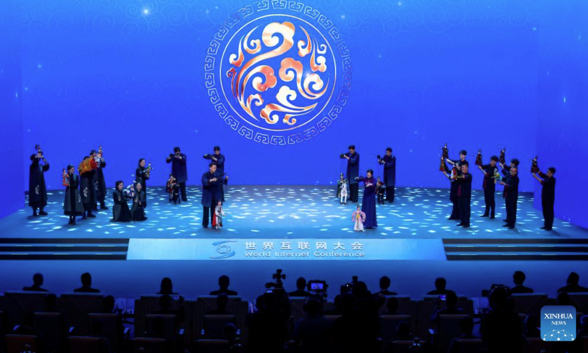 This photo taken on July 24, 2025 shows a performance of arts listed as intangible heritage during the opening ceremony of the World Internet Conference (WIC) Digital Silk Road Development Forum in Quanzhou, southeast China's Fujian Province. Themed on Embracing the Digital and Intelligent Maritime Silk Road -- Jointly Building a Community with a Shared Future in Cyberspace, the forum kicked off here on Thursday, drawing more than 600 guests from 49 countries and regions and 13 international institutions. (Xinhua/Wei Peiquan)