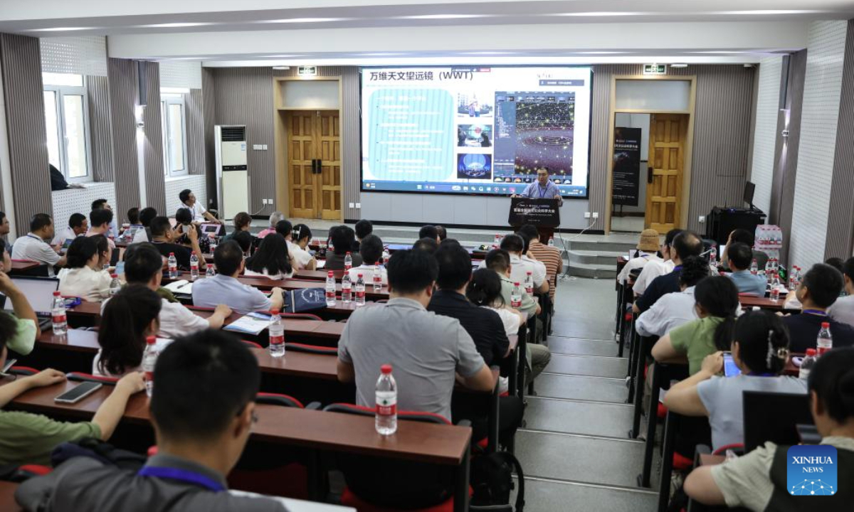 Attendees listen to a report during the first edition of Citizen Science Summit in Astronomy in Dalian, northeast China's Liaoning Province, July 31, 2025. The event was held here on Thursday, aiming to promote the popularization and public participation of astronomy. (Xinhua/Pan Yulong)