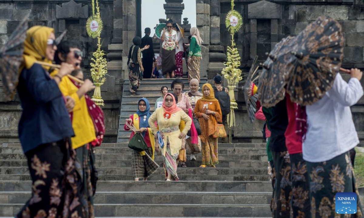 Women wearing traditional Kebaya participate in a fashion show during a commemoration of National Kebaya Day held at Prambanan Temple complex in Yogyakarta, Central Java, Indonesia, July 24, 2025. (Photo by Agung Supriyanto/Xinhua)