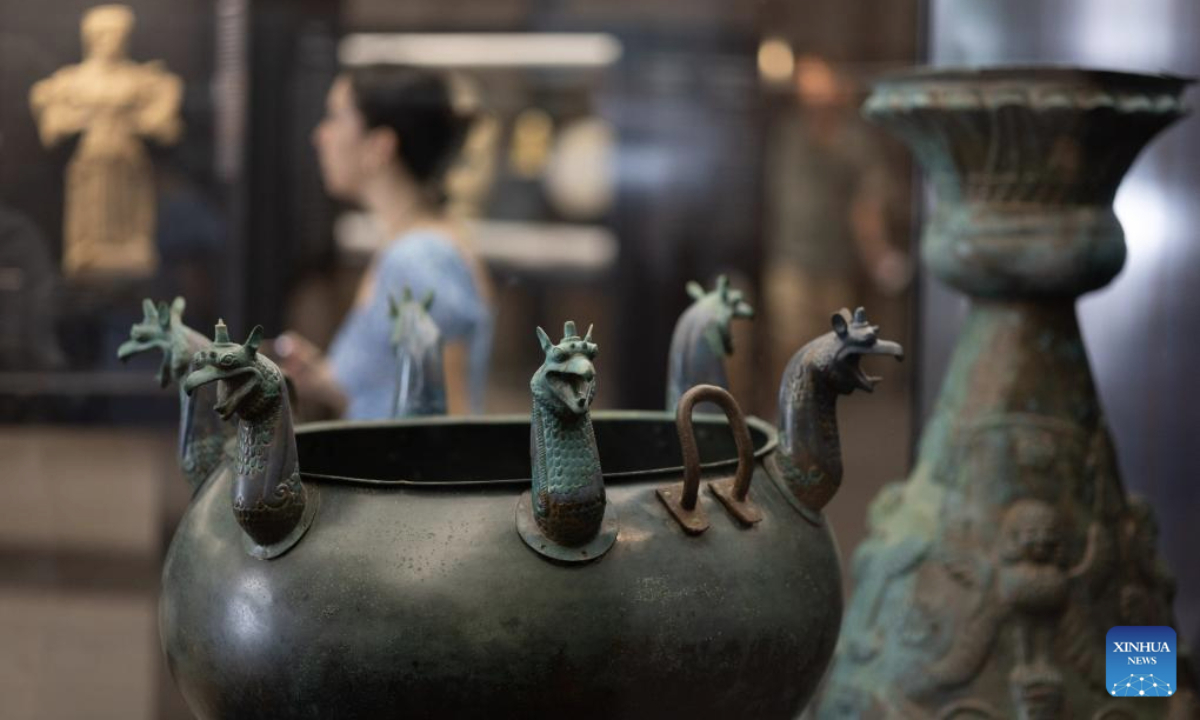 A set of bronze cauldron is displayed at the Museum of Rescued Art in Rome, Italy, July 24, 2025. The Museum of Rescued Art, part of the National Roman Museum network, reopened in June, showcasing over a hundred lost Italian antiquities recovered over the past three years by Italy's renowned art protection unit. (Xinhua/Li Jing)