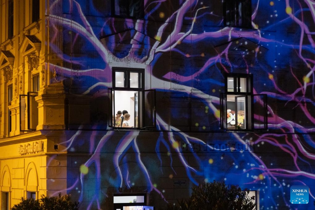 A light performance is pictured during the Zsolnay Light Festival held in downtown Pecs, Hungary on July 4, 2025. (Photo: Xinhua)