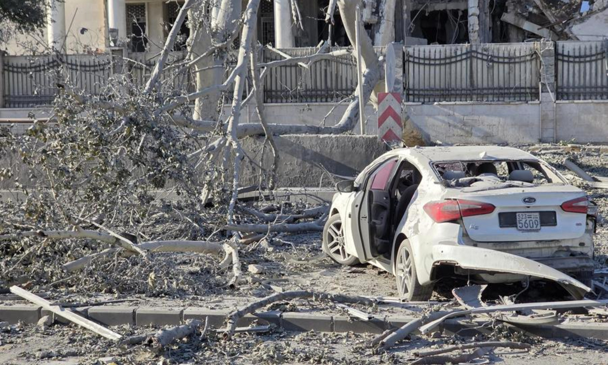 A damaged car is seen after Israel struck the Syrian Army General Command and the Defense Ministry compound in Umayyad Square in central Damascus, Syria, July 16, 2025. (Str/Xinhua)