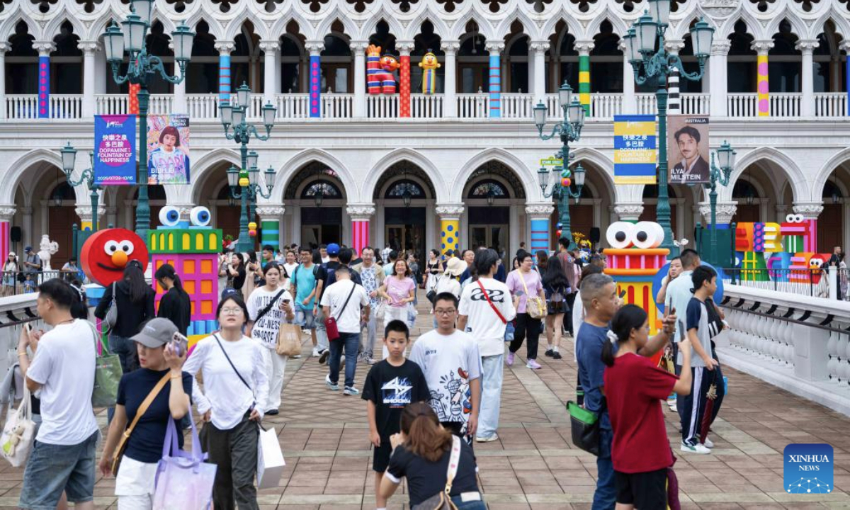 Tourists visit the special exhibition Dopamine: Fountain of Happiness at the Venetian Macao in Macao, south China, July 29, 2025. As a special exhibition of Art Macao: Macao International Art Biennale 2025, the event kicked off here on Tuesday. (Xinhua/Cheong Kam Ka)
