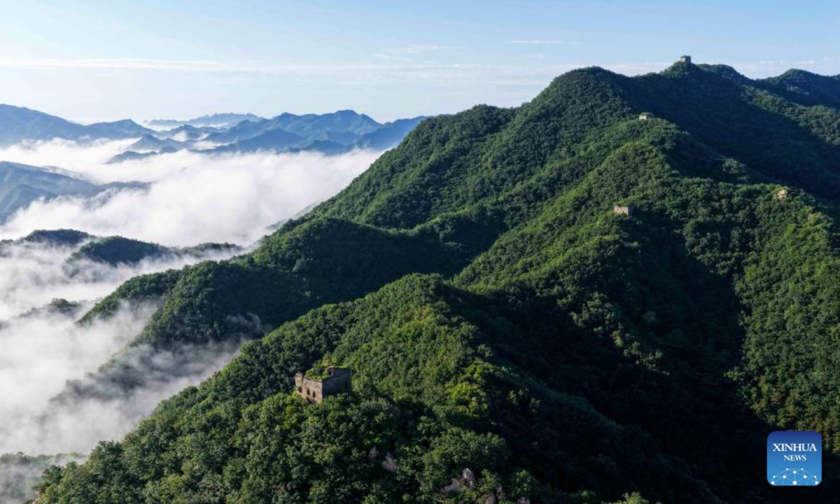 An aerial drone photo taken on July 21, 2025 shows a view of the Yumuling section of the Great Wall in Qianxi County, north China's Hebei Province. (Photo by Liu Mancang/Xinhua)