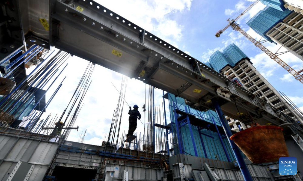 Workers work at a construction site of a urban village renovation project in Nanning City, south China's Guangxi Zhuang Autonomous Region, July 21, 2025. Since this year on, Guangxi's provincial department of finance has raised a total of about 3.4 billion yuan financial subsidy (about 473.9 million U.S. dollars) to support the construction of affordable housing projects in urban areas, which has improved the public demand for high-quality housing. (Xinhua/Huang Xiaobang)