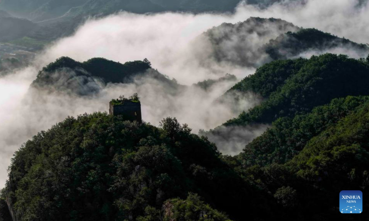 An aerial drone photo taken on July 21, 2025 shows a view of the Yumuling section of the Great Wall in Qianxi County, north China's Hebei Province. (Photo by Liu Mancang/Xinhua)