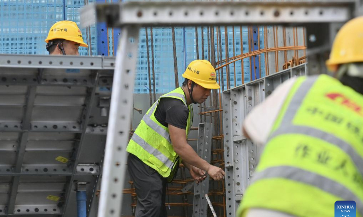 Workers work at a construction site of a urban village renovation project in Nanning City, south China's Guangxi Zhuang Autonomous Region, July 21, 2025. Since this year on, Guangxi's provincial department of finance has raised a total of about 3.4 billion yuan financial subsidy (about 473.9 million U.S. dollars) to support the construction of affordable housing projects in urban areas, which has improved the public demand for high-quality housing. (Xinhua/Huang Xiaobang)