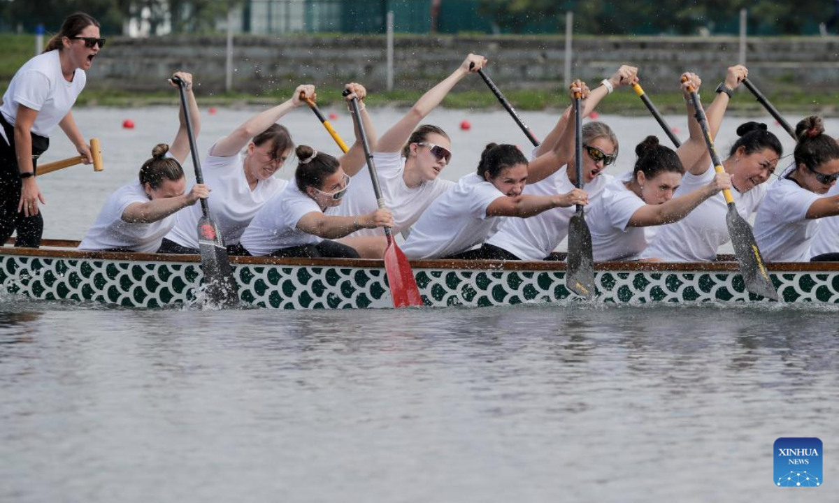 Teams compete during the dragon boat championship of Russia in Moscow, Russia, July 23, 2025. (Photo by Alexander Zemlianichenko Jr/Xinhua)