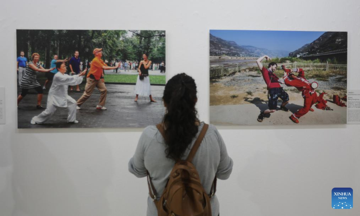 A visitor views exhibits at the China Story photo exposition held in Tlalnepantla, Mexico, July 5, 2025. The China Story photo exposition, which kicked off here on Saturday, showcases 40 groups of images revealing the beauty of Chinese landscapes and the depth of Chinese culture, offering local audiences a vivid window into modern China. (Photo by Francisco Canedo/Xinhua)