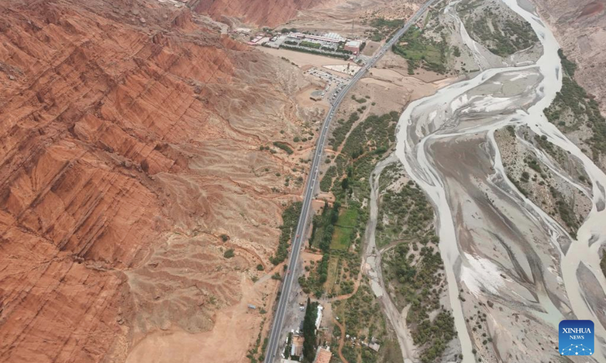An aerial drone photo taken on July 17, 2025 shows the scenery along the Duku Highway in northwest China's Xinjiang Uygur Autonomous Region. Northwest China's Duku Highway, considered one of the most scenic roads in the country, sees a tourism boom in the summer.

The 561-kilometer highway connects Dushanzi in the north of Xinjiang with Kuqa City in the south, running through varied landscapes that include canyons, glaciers, lakes and grasslands. (Xinhua/Hu Huhu)
