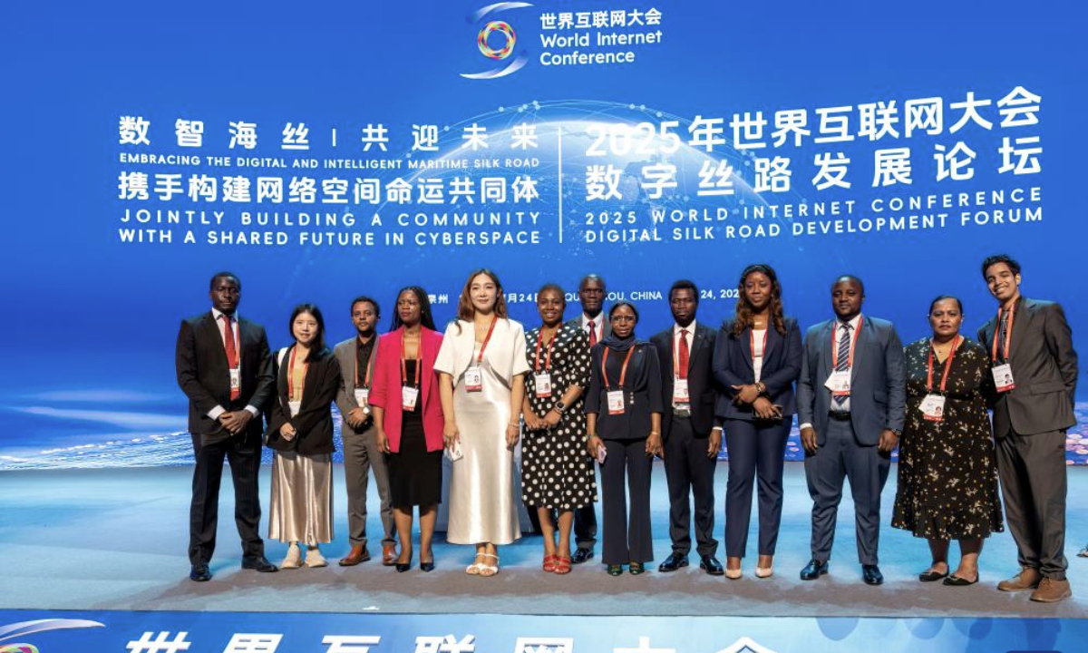 Guests pose for a group photo after the opening ceremony of the World Internet Conference (WIC) Digital Silk Road Development Forum in Quanzhou, southeast China's Fujian Province, July 24, 2025. Themed on Embracing the Digital and Intelligent Maritime Silk Road -- Jointly Building a Community with a Shared Future in Cyberspace, the forum kicked off here on Thursday, drawing more than 600 guests from 49 countries and regions and 13 international institutions. (Xinhua/Wei Peiquan)