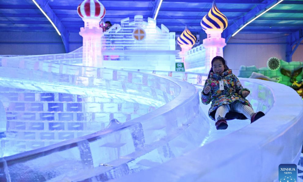 A child has fun at an indoor snow and ice world in Huaian, east China's Jiangsu Province, July 15, 2025. An indoor snow and ice world, established at Jinhu water forest scenic spot in Huaian, provides tourists with a refreshing experience in summer. (Xinhua/Ji Chunpeng)