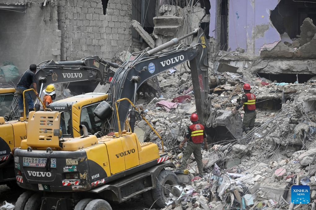 Rescuers work at the scene of a residential building collapse in Karachi, Pakistan, July 5, 2025. The death toll in the building collapse in Pakistan's southern port city of Karachi has jumped to 27 as rescuers retrieved more bodies, a spokesperson of the state-owned rescue organization Rescue 1122 said on Sunday. (Photo: Xinhua)