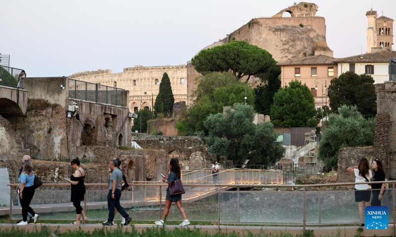 Tourists visit the Imperial Forum during a night tour in Rome, Italy, July 5, 2025. The Imperial Forum has opened to visitors on every Friday, Saturday and Sunday evening since June 20 and will last until September 28. (Photo: Xinhua)