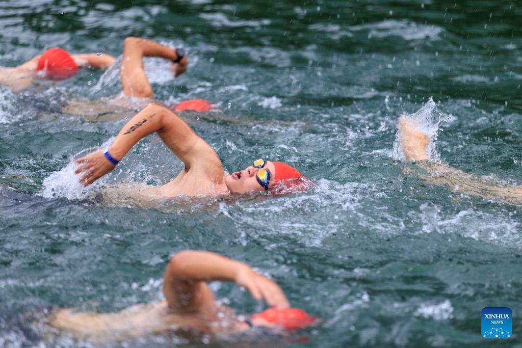 Participants take part in the 2025 Lotte Aquathlon competition including Lake Swim and Sky Run, in Seoul, South Korea, July 6, 2025. The competition attracted more than 800 participants. (Photo: Xinhua)