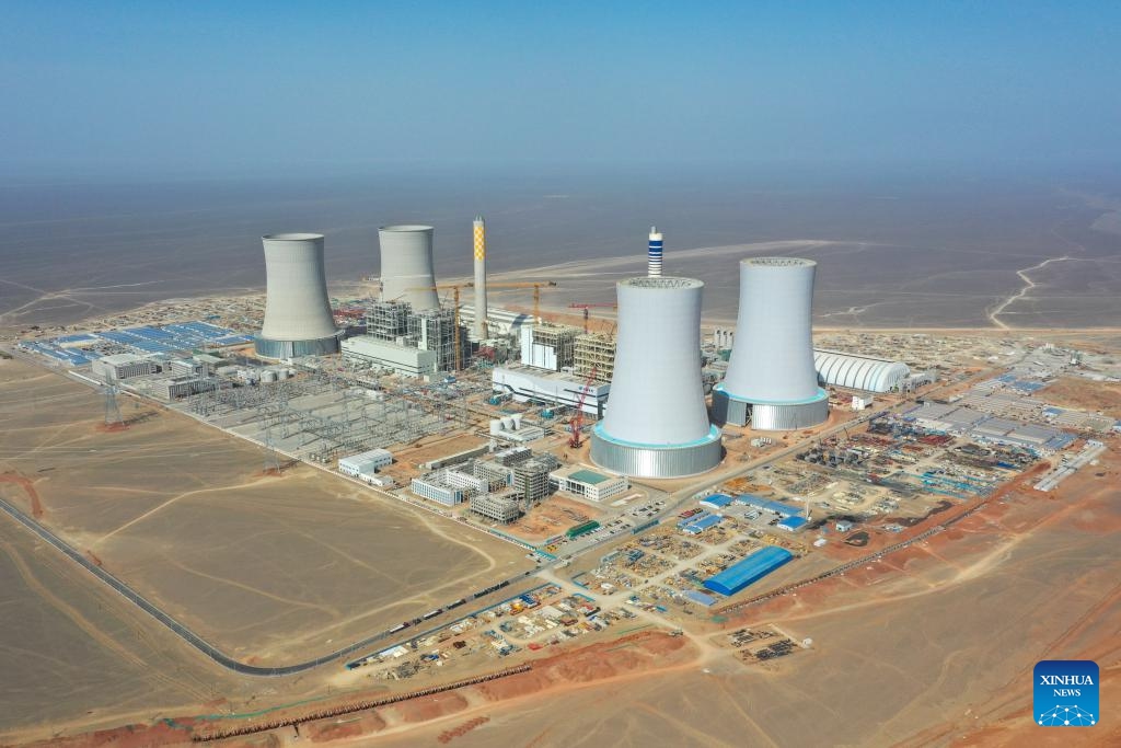An aerial drone photo taken on March 22, 2025 shows a power plant of the Hami-Chongqing ±800 kV ultra-high voltage direct current power transmission project in Hami, northwest China's Xinjiang Uygur Autonomous Region. (Photo: Xinhua)