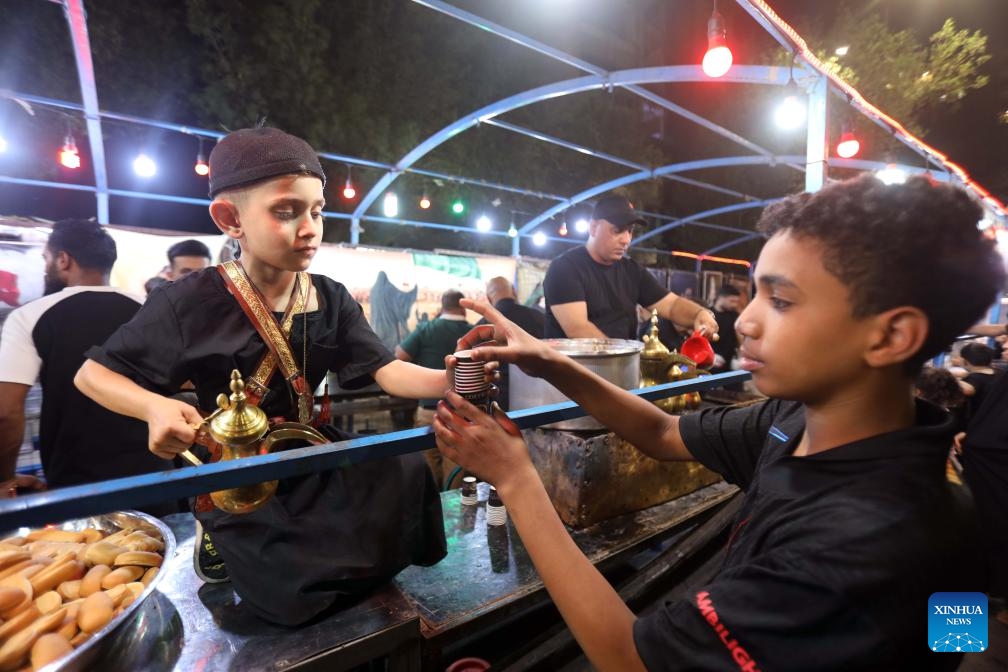 People participate in commemorative activity on the occasion of Ashura, in Baghdad, Iraq, on July 5, 2025. Ashura takes place on the 10th day of Muharram, the first month in the Islamic lunar calendar. (Photo: Xinhua)