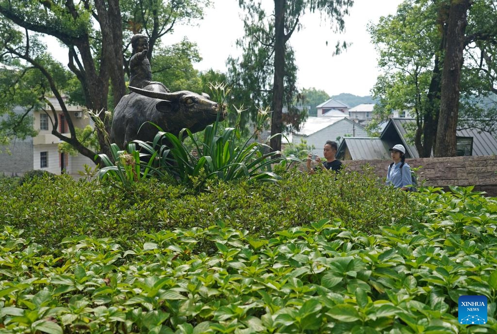 Tourist visit Diaoyuan Ancient Village of Ji'an, east China's Jiangxi Province, July 9, 2025. Tucked into the undulating hills of Ji'an City in east China's Jiangxi Province, Diaoyuan Village has stood for over 1,100 years -- the layout from above bearing a striking resemblance to a Taoist Tai Chi diagram. (Photo: Xinhua)