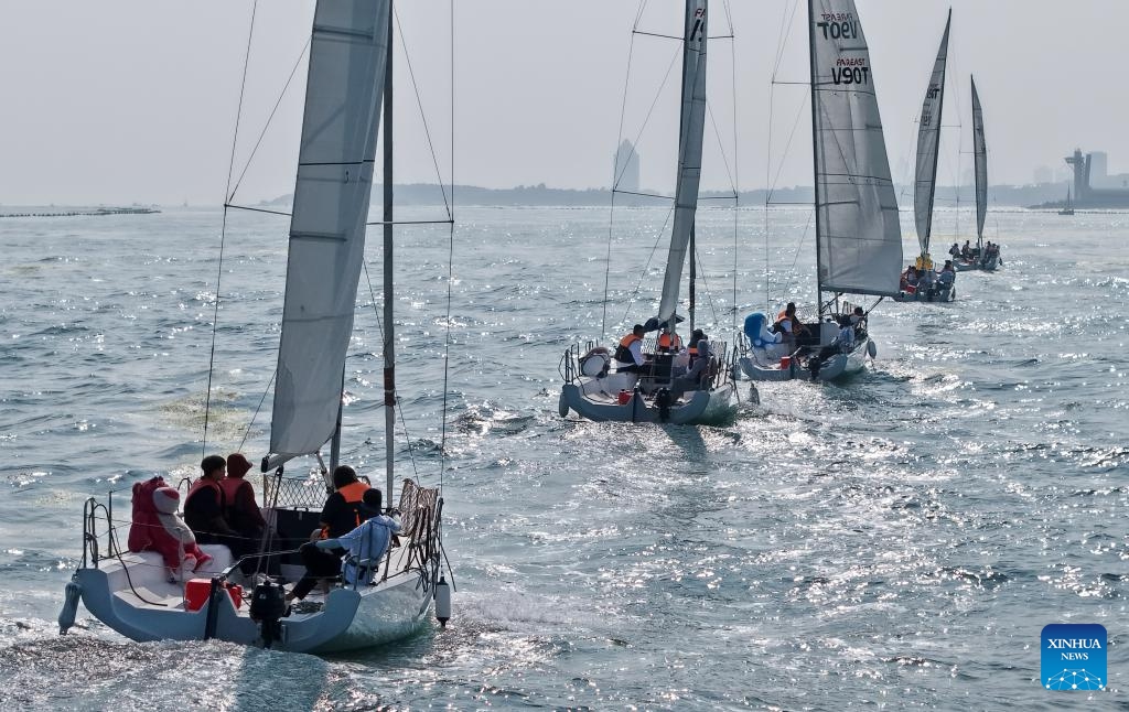 A drone photo taken on July 10, 2025 shows citizens and tourists participating in a sea cruising event in Laolong Bay area in Qingdao, east China's Shandong Province. A sea cruising event was held in the coastal city of Qingdao on Thursday to celebrate the 20th anniversary of the establishment of the Maritime Day of China and the 620th anniversary of Chinese explorer Zheng He's maritime voyages. (Photo: Xinhua)