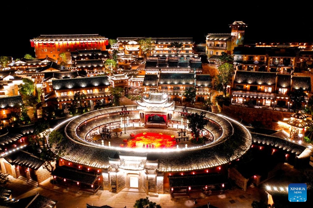 An aerial drone photo shows the Wangxian Valley Scenic Spot in Wangxian Township of Shangrao City, east China's Jiangxi Province, July 11, 2025. Once a granite mining quarry, Wangxian Valley has been transformed into a popular tourist destination following a government ban on disorderly mining, with its natural cliffs creatively repurposed into attractions such as cliffside hotels, cliff skywalks and waterfalls. (Photo: Xinhua)