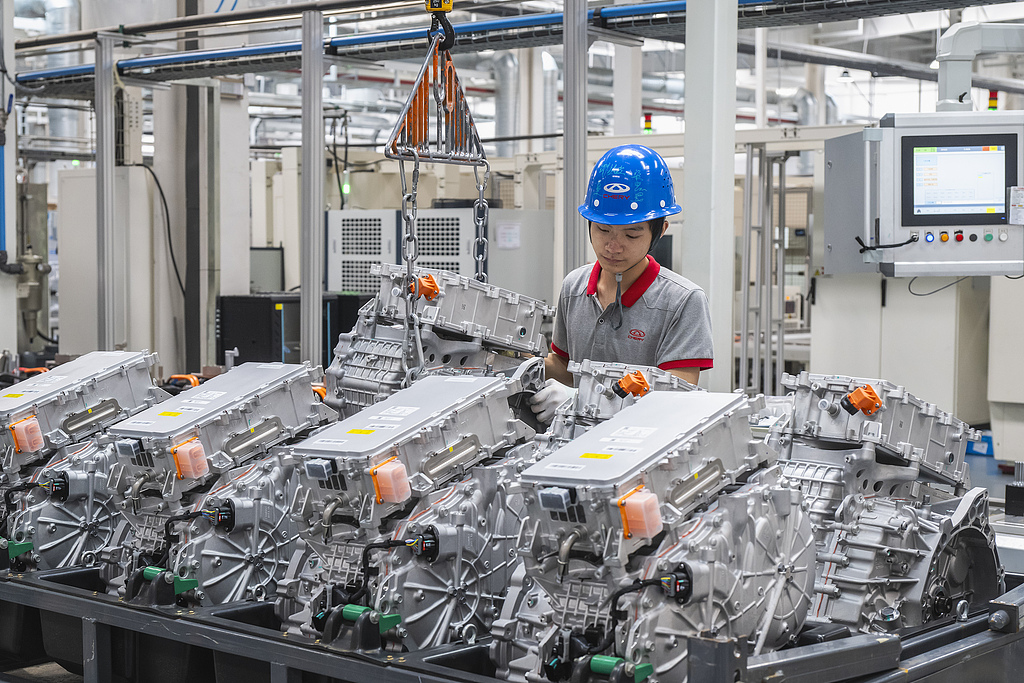 A worker assembles dedicated hybrid transmissions on an intelligent production line in Wuhu, East China's Anhui Province, on July 14, 2025. In recent years, Wuhu has fostered a business-friendly environment and boosted research and development efforts, accelerating growth in the new-energy vehicle sector. Photo: VCG