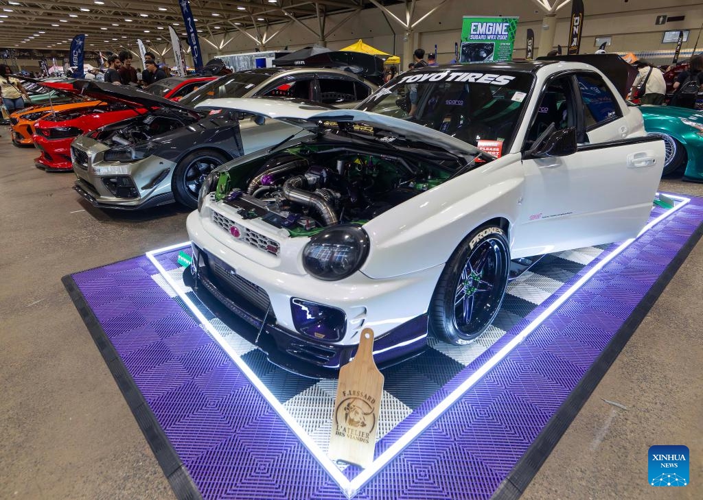 Modified vehicles are seen at the 2025 ImportFest in Toronto, Canada, on July 12, 2025. Showcasing hundreds of modified vehicles from across Canada and the United States, the annual one-day event was held here on Saturday (Photo: Xinhua)