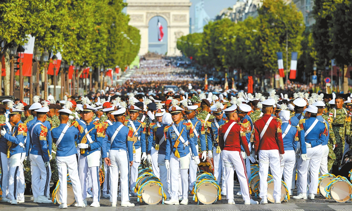 Indonesian army drumband Gabundan members wait for the start of the annual Bastille Day military parade on the Champs-Elysees Avenue in Paris on July 14, 2025. Photo: VCG 