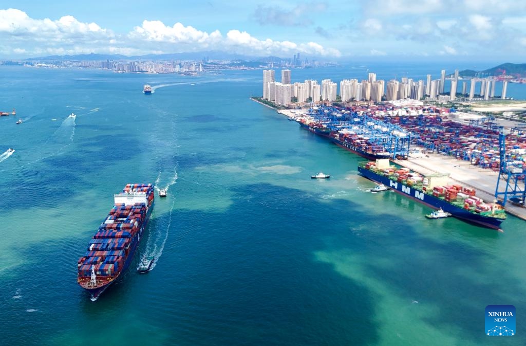This aerial drone photo taken on July 8, 2025 shows container ships entering Qingdao Port in Qingdao, east China's Shandong Province. China's maritime industry now handles nearly one-third of global maritime shipping volume, according to the 2025 China Maritime Day Forum held in the coastal town of Boao in south China's Hainan Province on Friday. China's booming marine economy is driving sustained and stable growth in global trade and development. (Photo: Xinhua)