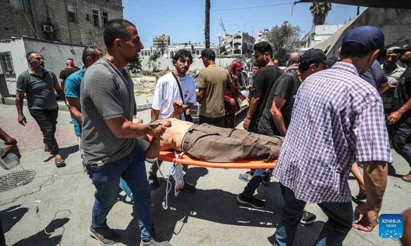 A wounded Palestinian is seen at a hospital following an Israeli airstrike in Gaza City, on July 13, 2025. At least 58 Palestinians were killed by Israeli airstrikes and gunfire across the Gaza Strip on Sunday, Palestinian sources said. (Photo: Xinhua)