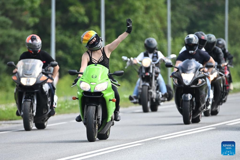 Motorcyclists take part in a parade along the Narva-Tallinn highway during Narva Bike 2025 in Estonia, July 12, 2025. The popular biker festival kicked off in the Estonian city of Narva on Friday. More than 1,000 motorcycle enthusiasts from across Europe and beyond gathered at the medieval Narva Castle for a three-day event. (Photo: Xinhua)