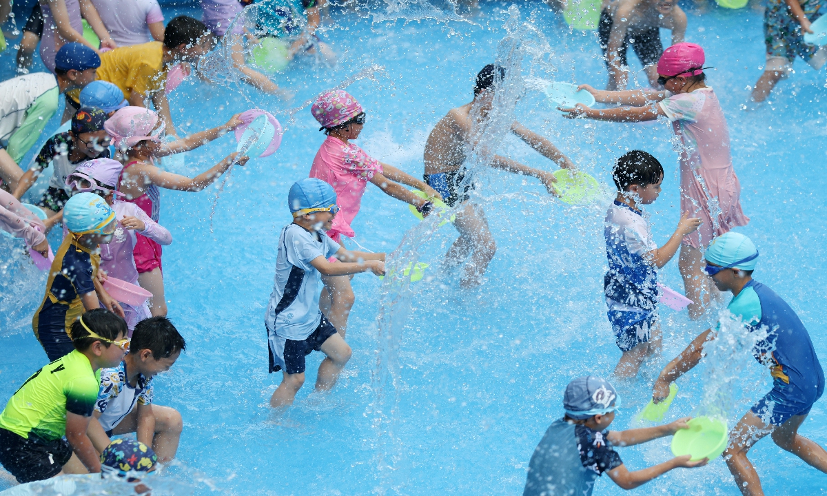 Children cool off during a summer camp in Hangzhou, East China's Zhejiang Province, on July 14, 2025. Photo: VCG