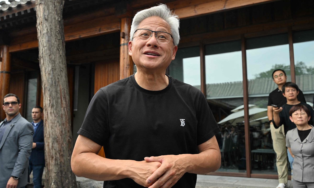 Nvidia CEO Jensen Huang speaks to journalists as he arrives for a press conference at a hotel in Beijing on July 16, 2025.Photo: VCG