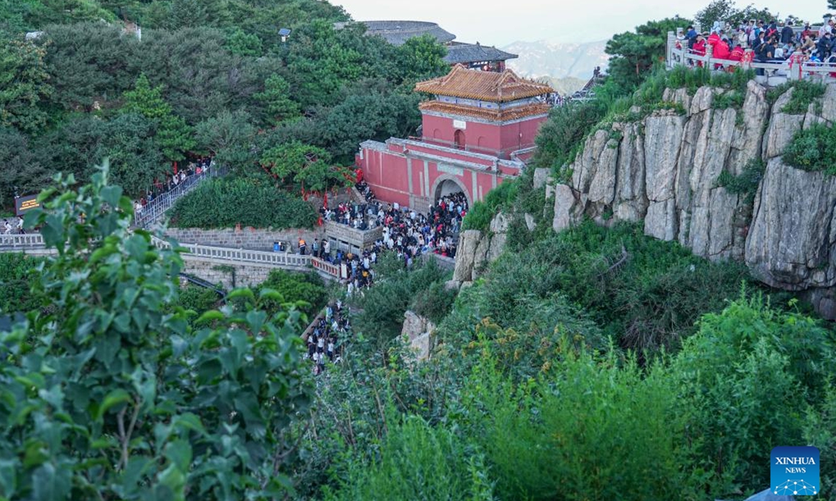 Tourists visit Mount Tai in Tai'an, east China's Shandong Province, July 31, 2025. (Xinhua/Zhu Zheng) 