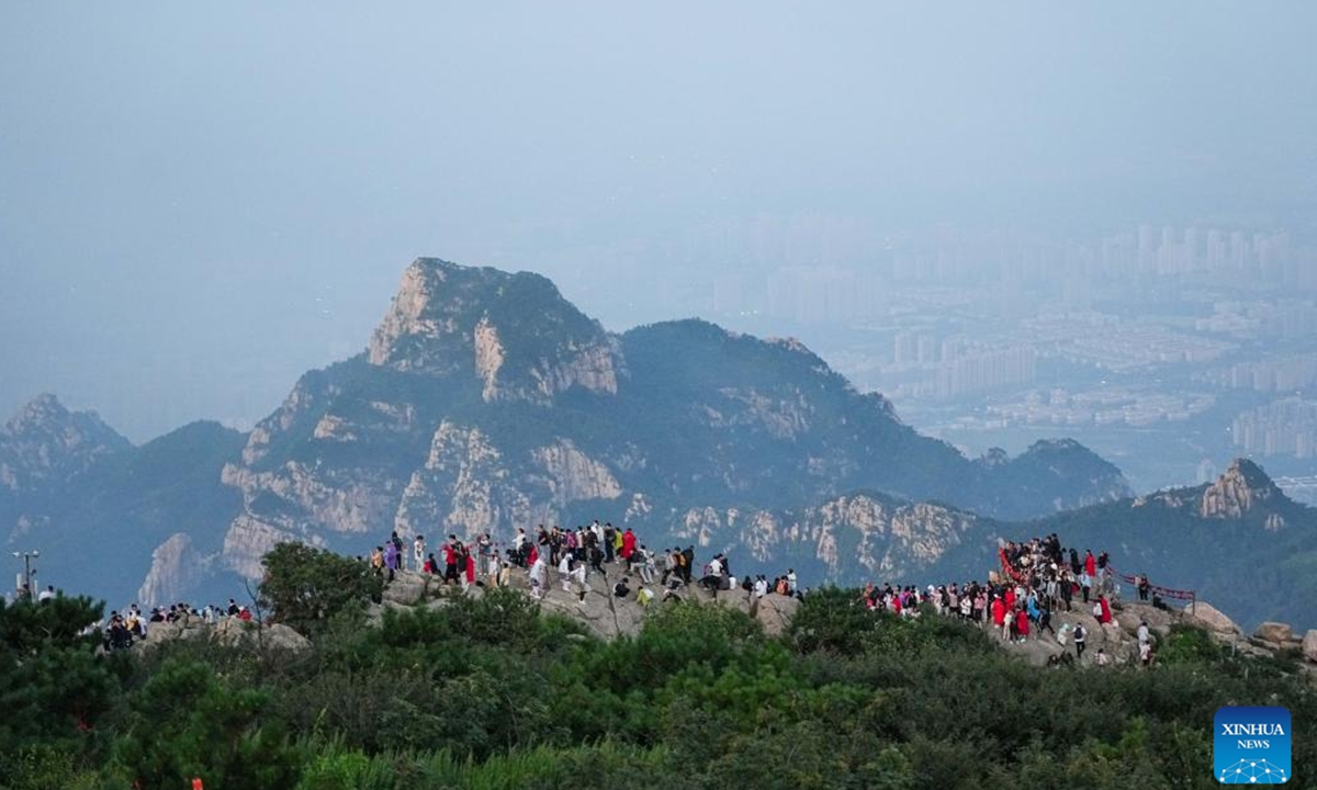 Tourists visit Mount Tai in Tai'an, east China's Shandong Province, July 31, 2025. (Xinhua/Zhu Zheng)

