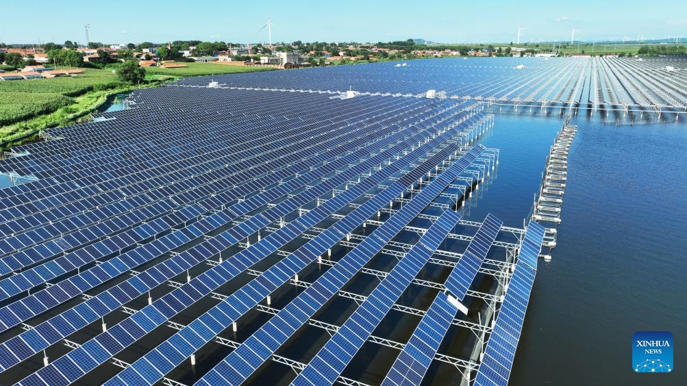 An aerial drone photo taken on July 30, 2025 shows photovoltaic panels on a reservoir in Tieling County, northeast China's Liaoning Province. In recent years, Tieling County has worked actively to promote green energy industries including wind power, photovoltaic power, hydrogen energy, so as to make progress in high-quality development of regional economy. (Xinhua/Yang Qing)