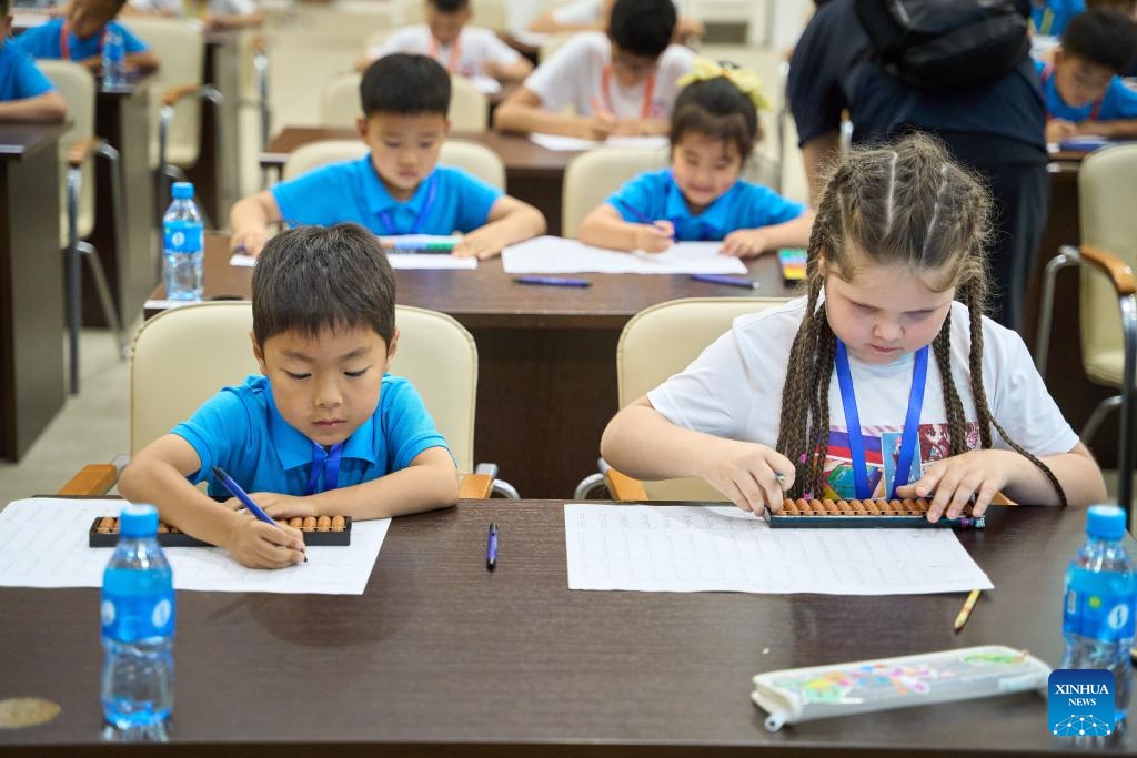 Chinese and Russian pupils participate in an abacus competition in Vladivostok, Russia, July 19, 2025. The Pacific Cup 2025 International Mental Arithmetic Olympiad was held Saturday in Russia's Far Eastern city of Vladivostok. The competition, organized by Russia's Eastern Association of Mental Arithmetic, brought together 123 primary school students from Russia and China. (Photo: Xinhua)