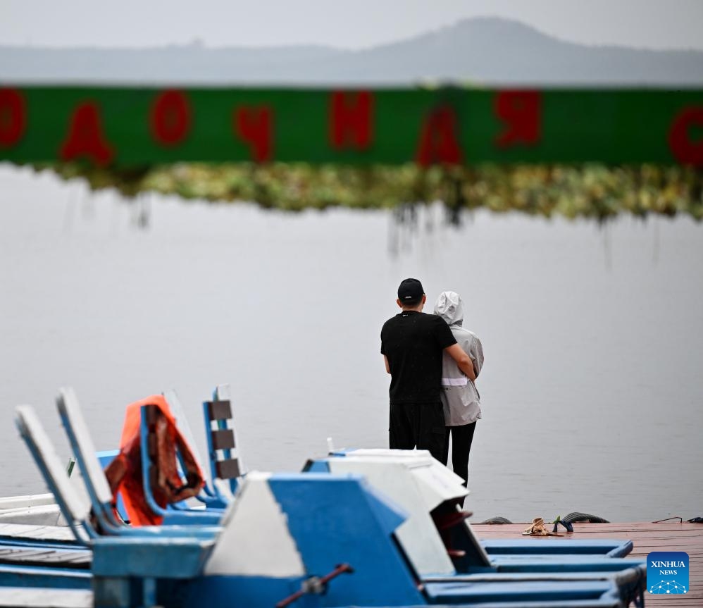 Tourists visit the Burabay National Park in Akmola region, Kazakhstan, on July 18, 2025. Burabay National Park is a famous vacation destination in Kazakhstan known for its spectacular natural landscapes and rich biodiversity. (Photo: Xinhua)