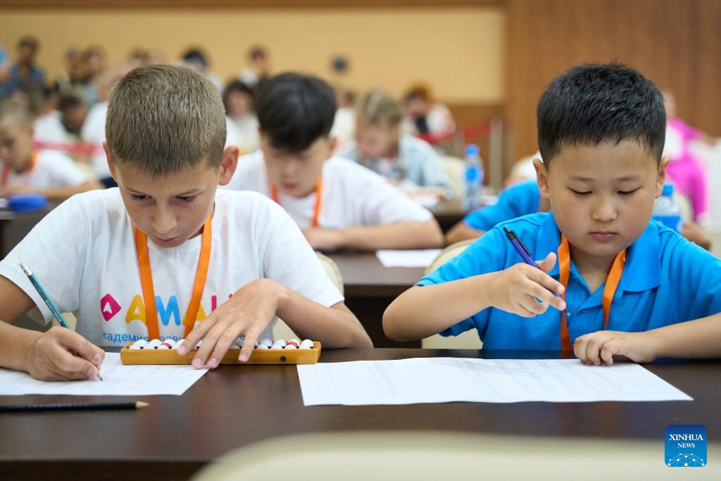 Chinese and Russian pupils participate in an abacus competition in Vladivostok, Russia, July 19, 2025. The Pacific Cup 2025 International Mental Arithmetic Olympiad was held Saturday in Russia's Far Eastern city of Vladivostok. The competition, organized by Russia's Eastern Association of Mental Arithmetic, brought together 123 primary school students from Russia and China. (Photo: Xinhua)