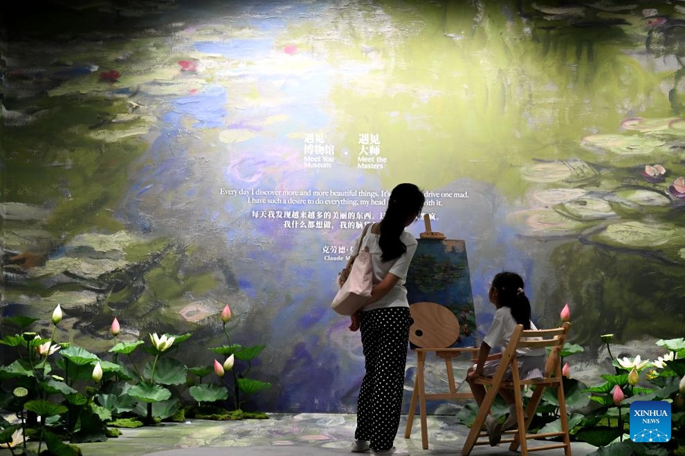 People visit the Tianjin branch of Meet You Museum in Tianjin, north of China, July 18, 2025. A branch of the Meet You Museum officially opened a few days ago at a historical and cultural block in Heping District of Tianjin. The block comprised of businesses, civil infrastructures and parking lots has been deteriorated after 15 years of service. The establishment of this museum branch injected new impetus into the transformation and upgrading of the block, which is also part of the urban renewal effort of Tianjin. (Photo: Xinhua)