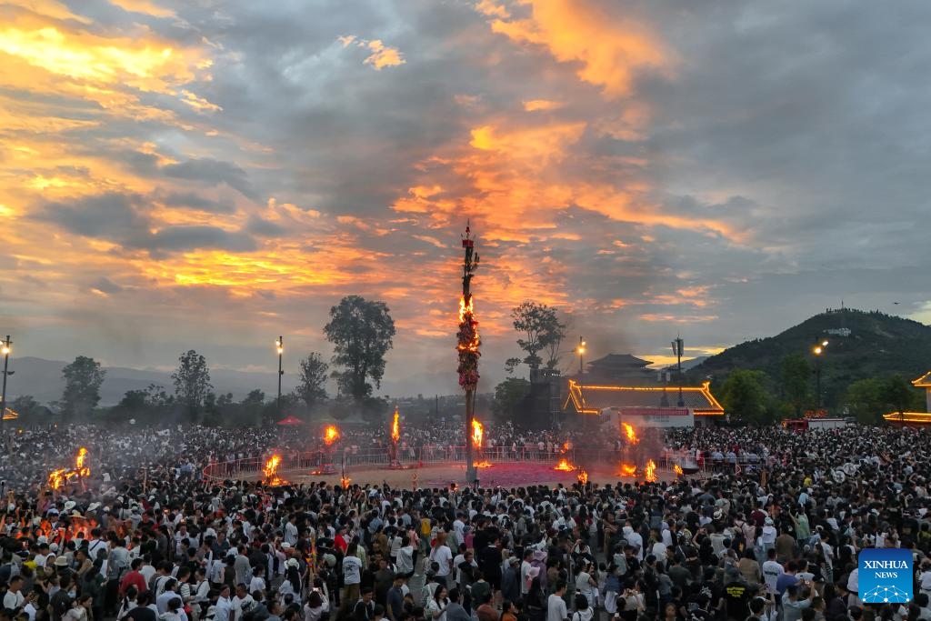 A drone photo taken on July 19, 2025 shows the opening ceremony of a torch festival in Weishan Yi and Hui Autonomous County, Dali Bai Autonomous Prefecture, southwest China's Yunnan Province. A torch festival kicked off here on Saturday. (Photo: Xinhua)