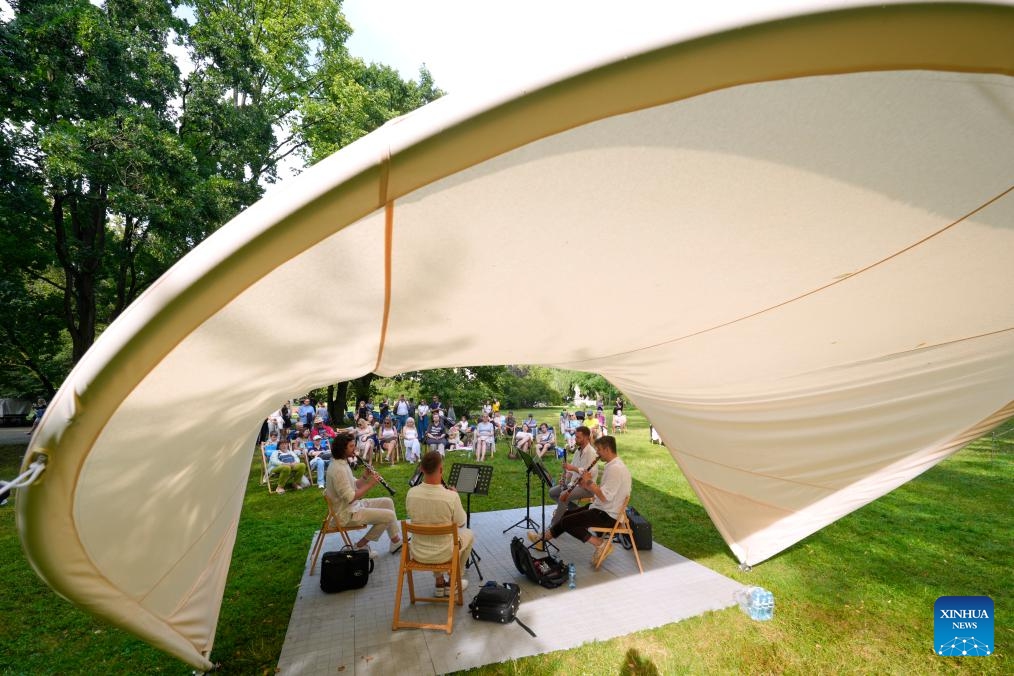 People attend the 12th Silence Zone Festival at Lazienki Park in Warsaw, Poland on July 20, 2025. The festival is taking place here from July 12 to Aug. 3, with more than 100 open-air concerts scheduled on weekends. (Photo: Xinhua)