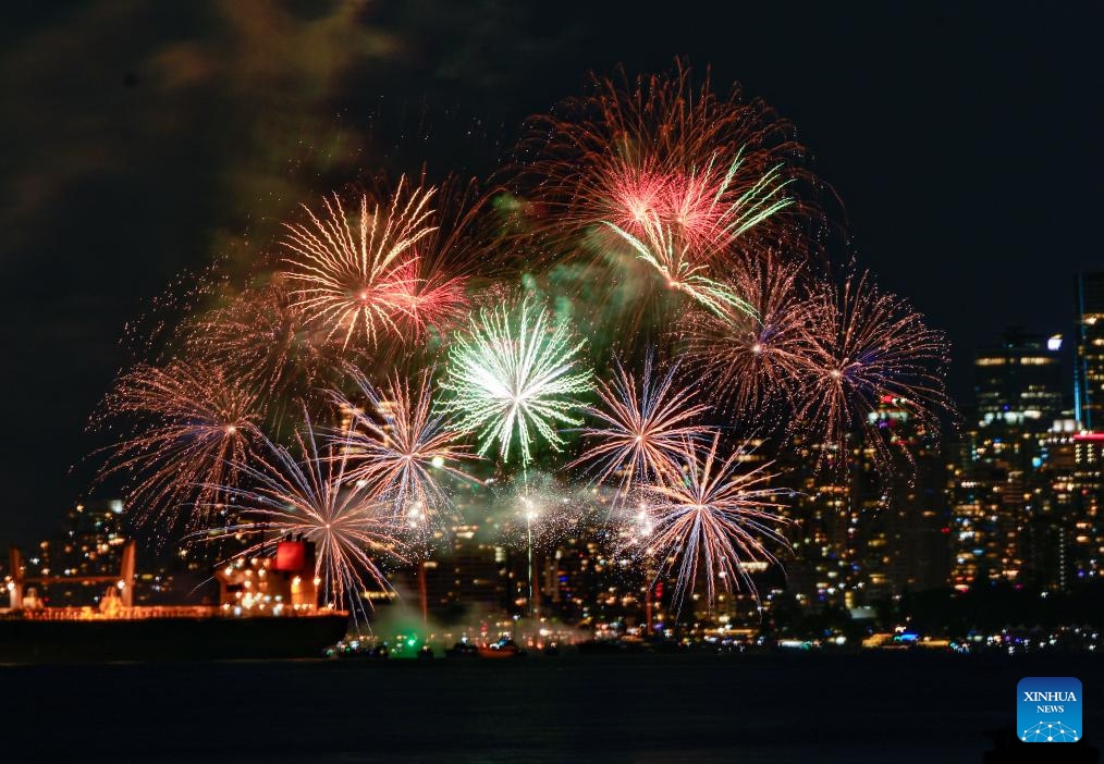 Fireworks light up the sky during the 2025 Celebration of Light at English Bay in Vancouver, British Columbia, Canada, July 19, 2025. The 33rd Celebration of Light fireworks show kicked off here Saturday. This year's event features an all-Canadian lineup, with pyrotechnic teams from Yukon, Quebec, and Nova Scotia scheduled to perform on July 19, 23, and 26, respectively. (Photo: Xinhua)