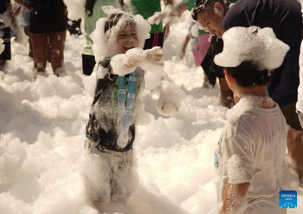 Children participate in the Bubble Run in Pomona, Los Angeles County, California, the United States, July 19, 2025. The annual Bubble Run took place Saturday at the Pomona Fairplex in Pomona, drawing over 8,000 participants. (Photo: Xinhua)