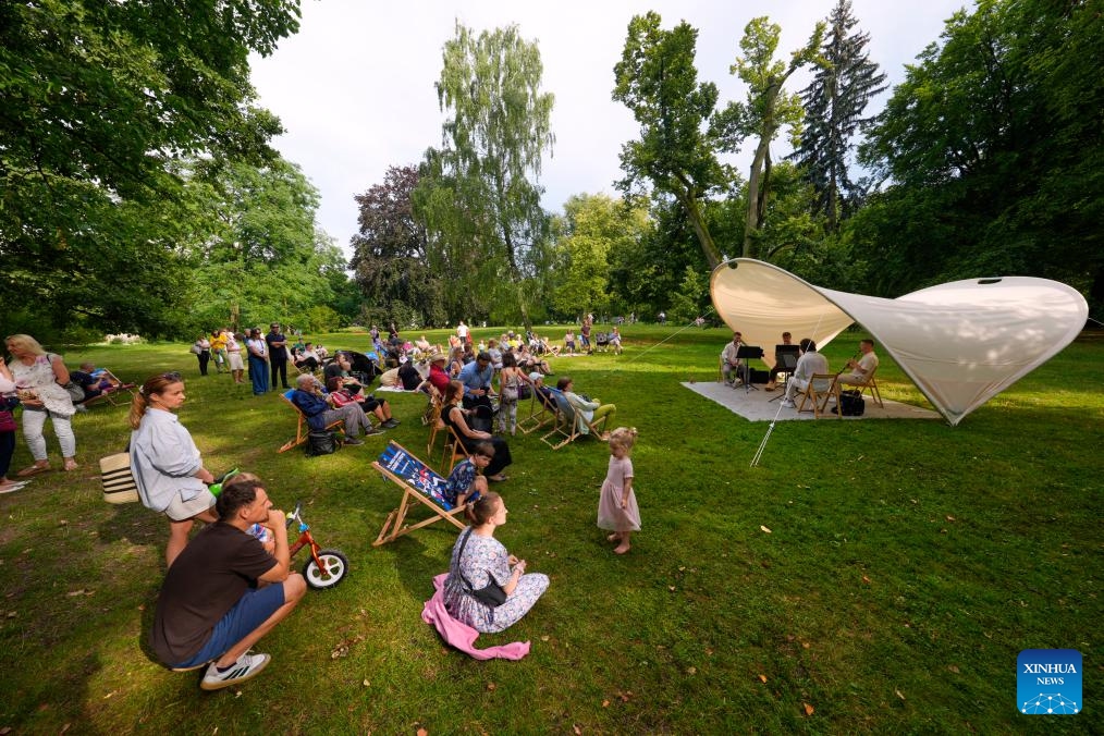 People attend the 12th Silence Zone Festival at Lazienki Park in Warsaw, Poland on July 20, 2025. The festival is taking place here from July 12 to Aug. 3, with more than 100 open-air concerts scheduled on weekends. (Photo: Xinhua)