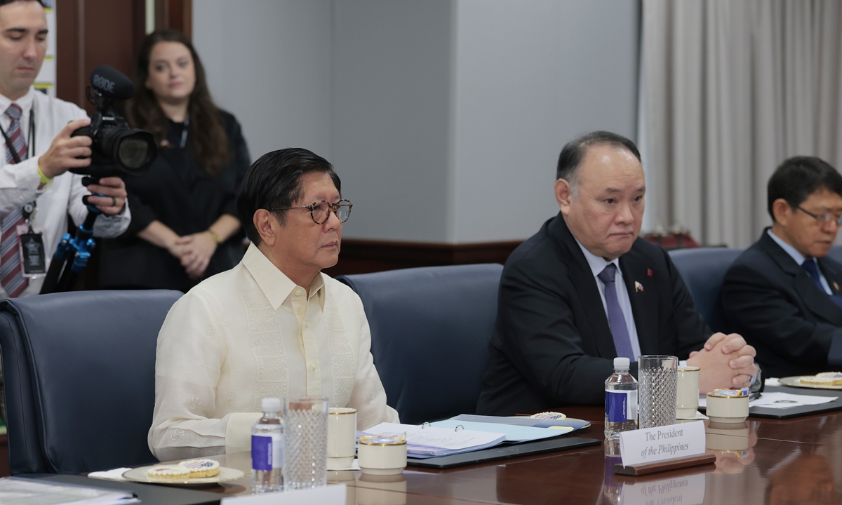 Philippine President Ferdinand Marcos Jr. listens as US Defense Secretary Pete Hegseth delivers remarks to reporters before a meeting at the Pentagon on July 21, 2025 in Arlington, Virginia, US. Photo: VCG