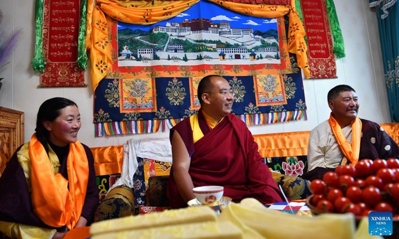 Panchen Erdeni Chos-kyi rGyal-po visits a resident's home at a local village in Nagqu, southwest China's Xizang Autonomous Region, July 23, 2025. Panchen Erdeni Chos-kyi rGyal-po visited the cities of Qamdo and Nagqu in southwest China's Xizang Autonomous Region from July 7 to 23, attending a series of religious activities and carrying out social research. (Photo: Xinhua)