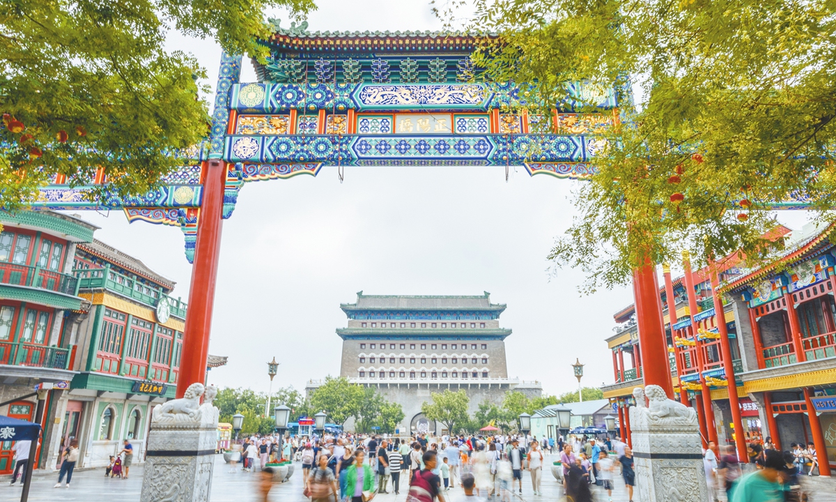 The Zhengyangmen Gate arrow tower viewed through a traditional Chinese archway along Qianmen Street in Beijing. Photo: Li Hao/GT