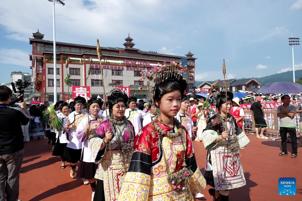 Cheerleading squad in ethnic costumes attend the restart ceremony of the Village Super League, also known as Cun Chao, staged in Rongjiang County, Guizhou Province in southwest China, July 26, 2025. (Photo: Xinhua)